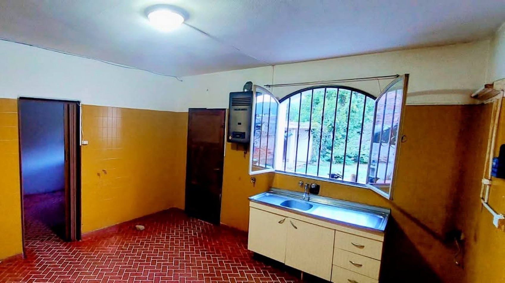 VENTA DE DEPARTAMENTO DE 2 DORMITORIOS. CENTRO DE COSQUIN. CA182