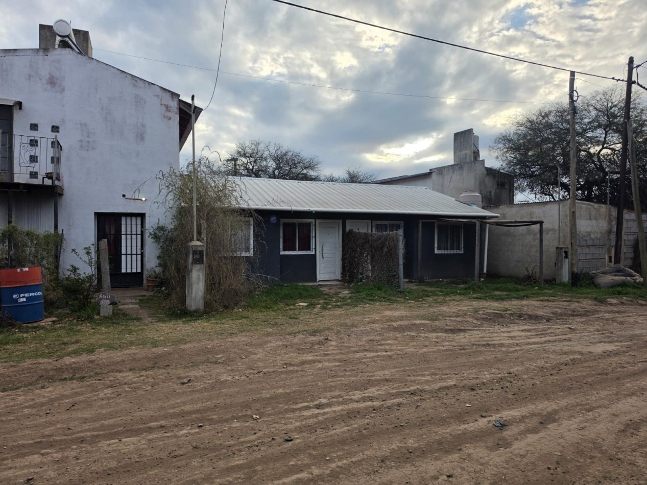 COMPLEJO DE 2 LOCALES Y 4 VIVIENDAS EN SAN ROQUE SOBRE COLECTORA. CA248